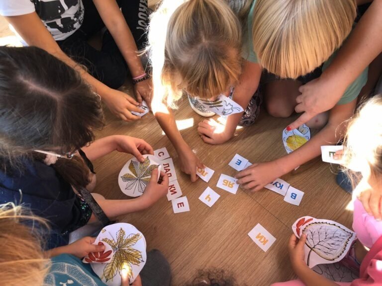 Children participating in an arts and educational games workshop.